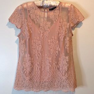 Lovely, feminine lace top with matching cami. Delicate mauve color.